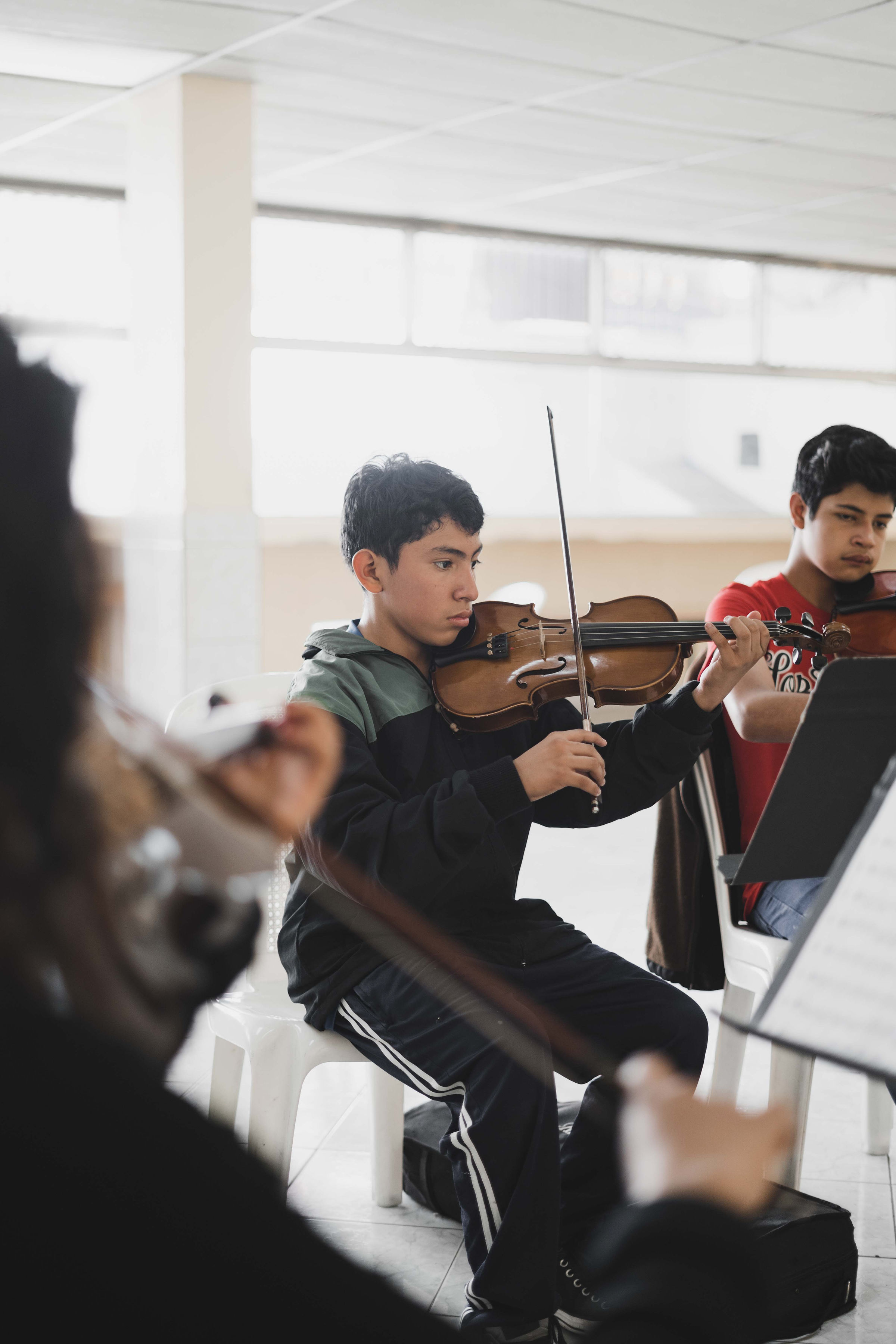 Students rehearsing together